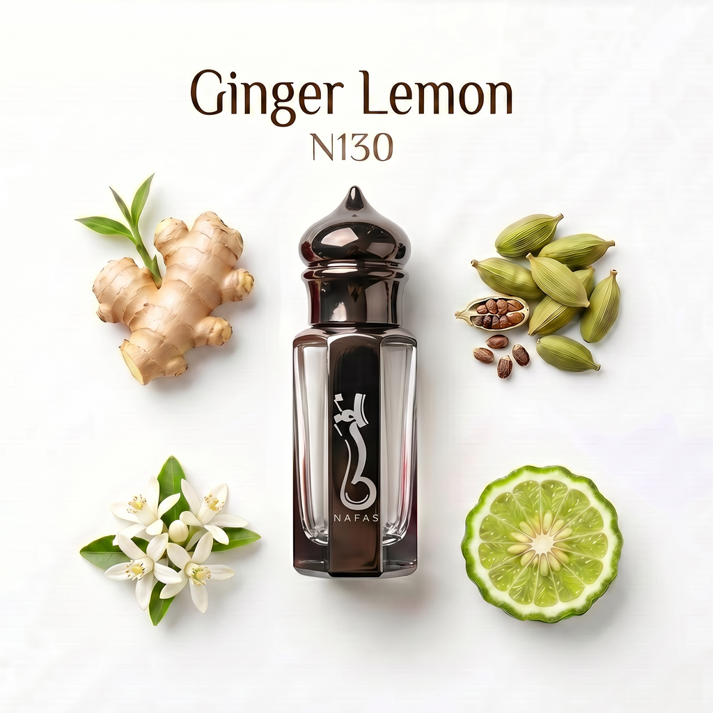 A perfume bottle labeled NAFAS with 'Ginger Lemon N130' text above it, arranged on a white background with ginger root, white flowers, green cardamom pods, and a lime slice around the bottle.